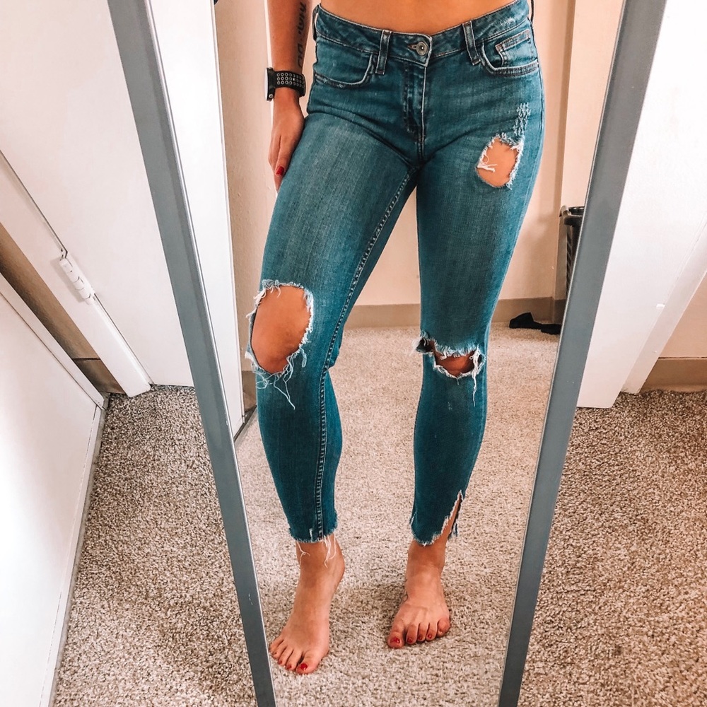 Zara distressed skinny jeans.